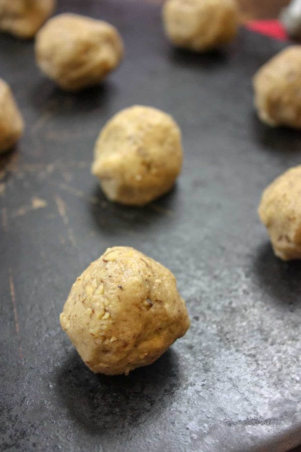 Picture of rolled cookies on a baking sheet