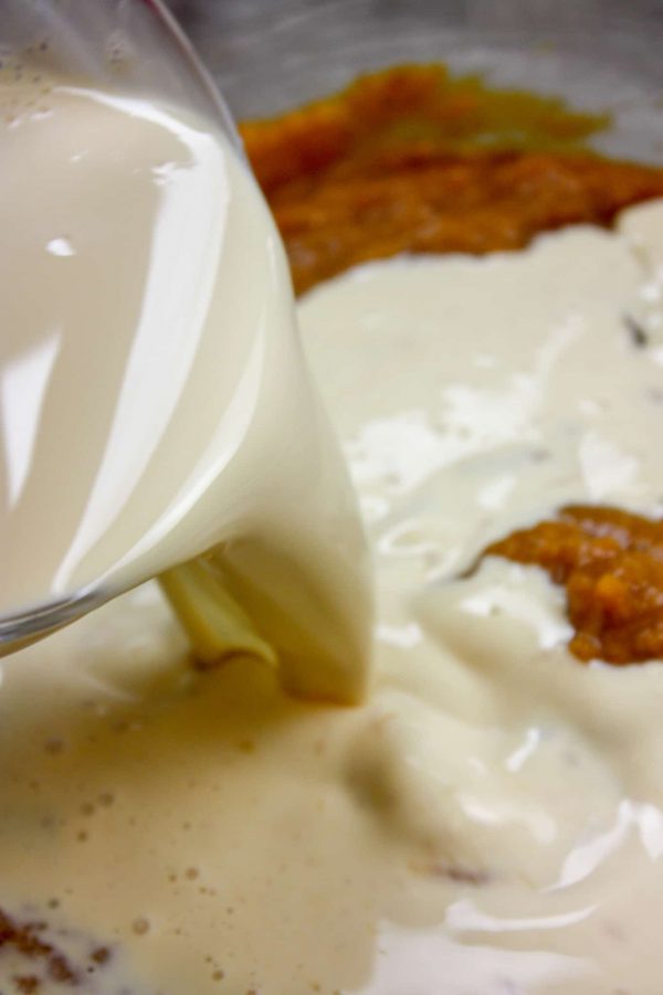 Picture of evaporated milk being poured into a bowl