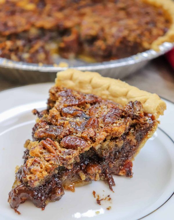 Picture of chocolate chip pecan pie on a plate