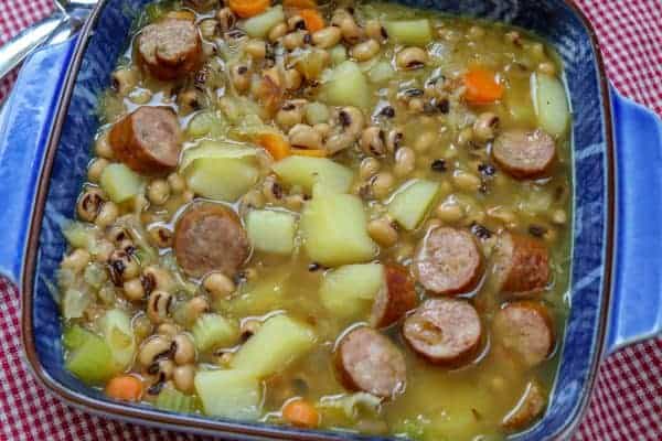 Picture of black eyed pea soup in a large blue dish