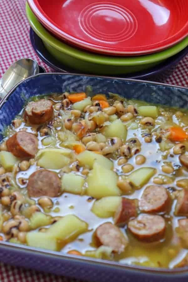 Picture of black eyed pea soup in a blue bowl