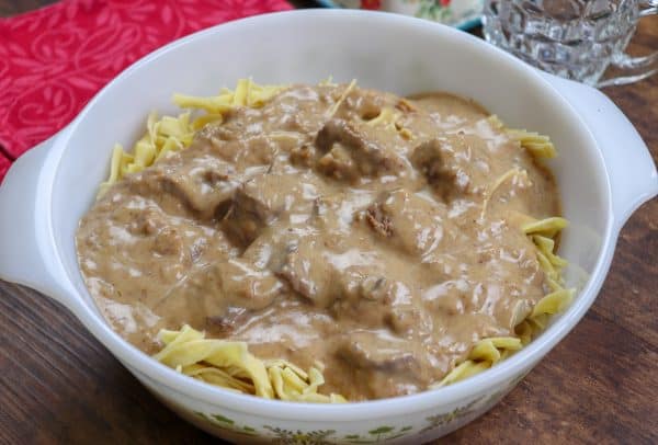 Picture of beef and noodles in a casserole dish.