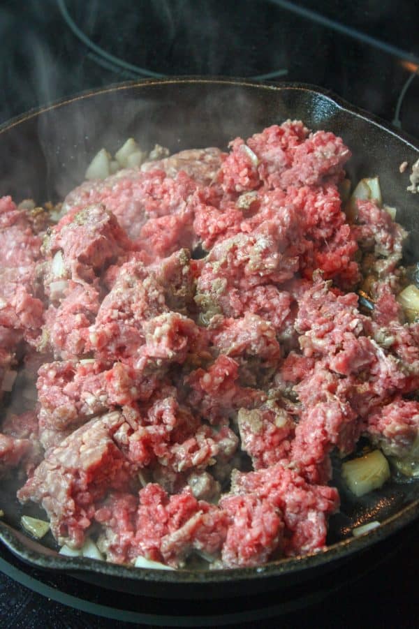 Picture of ground beef, onions, and garlic in a skillet