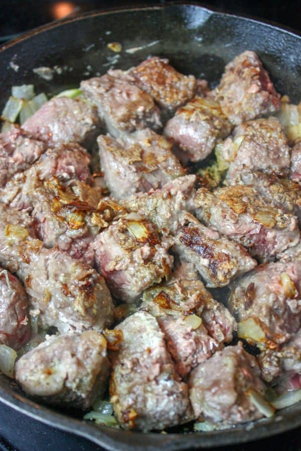 Picture of stew meat cooking in a skillet