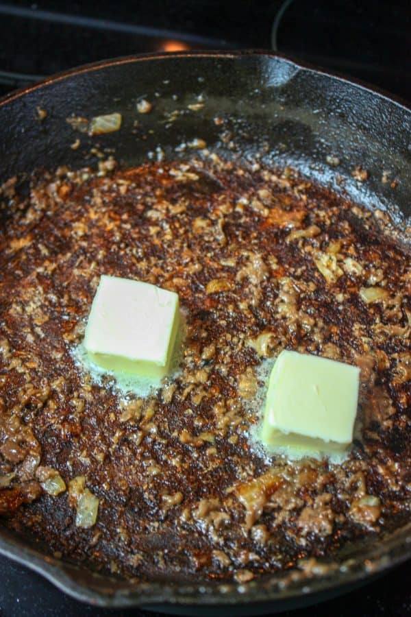 Picture of butter in a skillet.