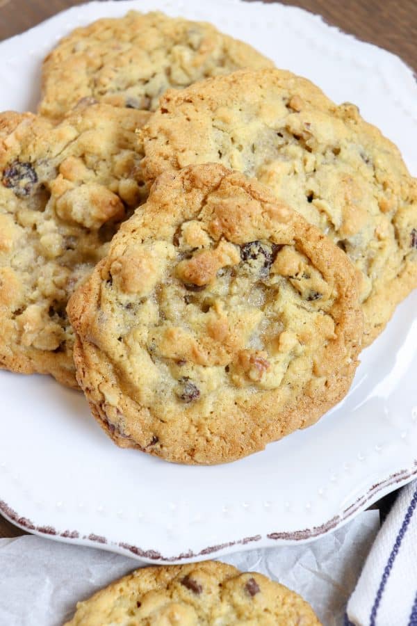 Picture of cowboy cookies on a white plate