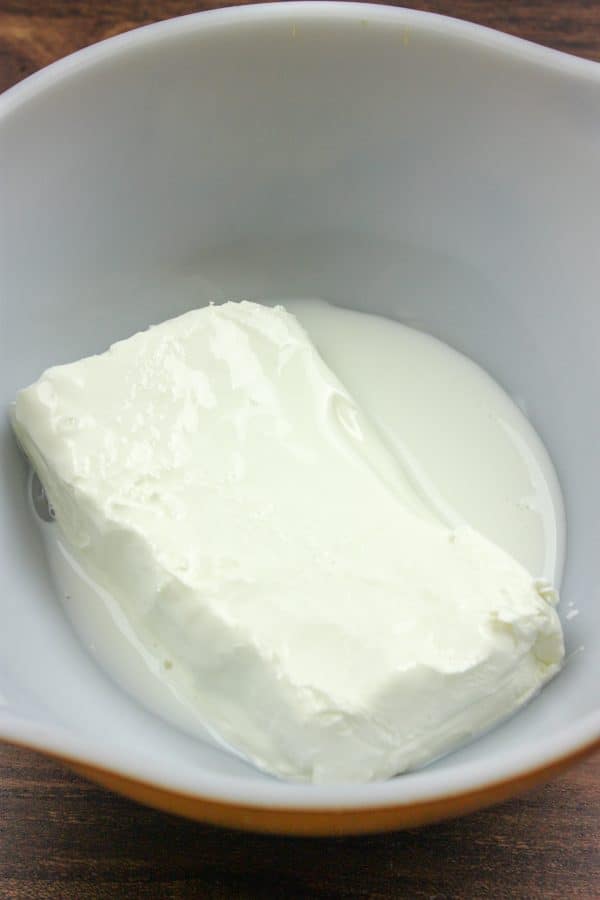Picture of cream cheese and milk in a bowl.
