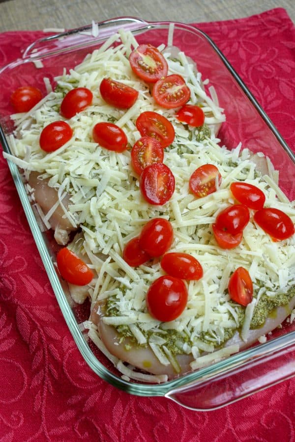 Picture of tomatoes on top of chicken