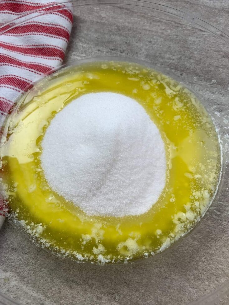 Melted butter and sugar in a glass bowl