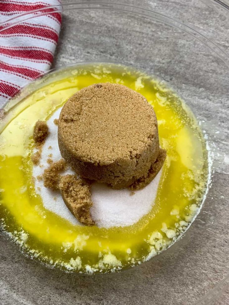 Melted butter, sugar, and brown sugar in a glass bowl