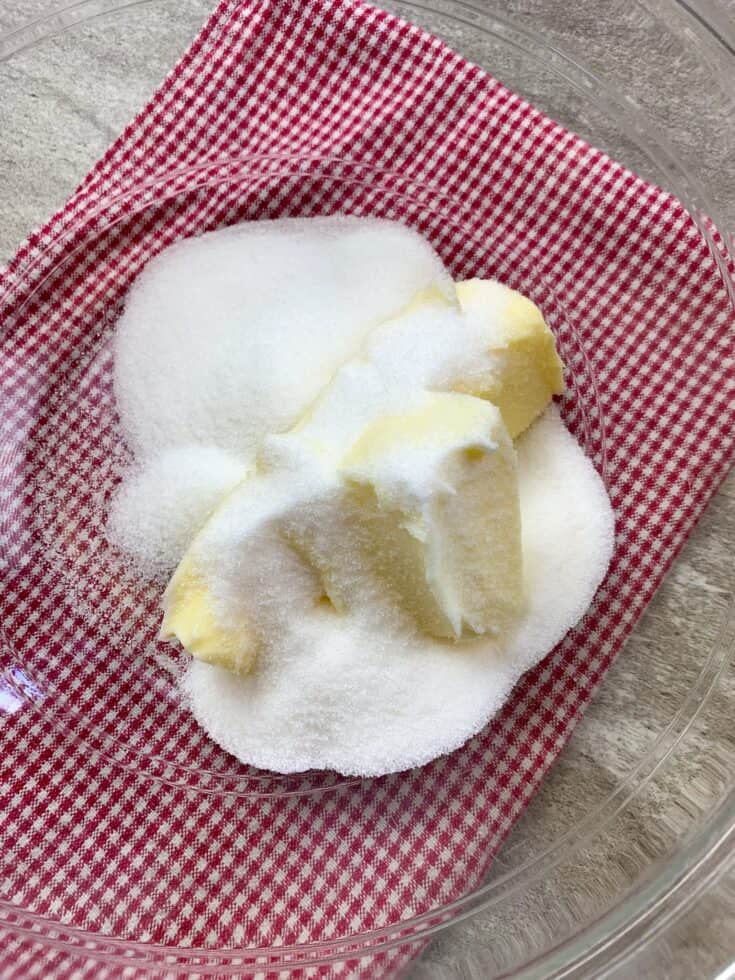 Sugar and butter in a glass bowl