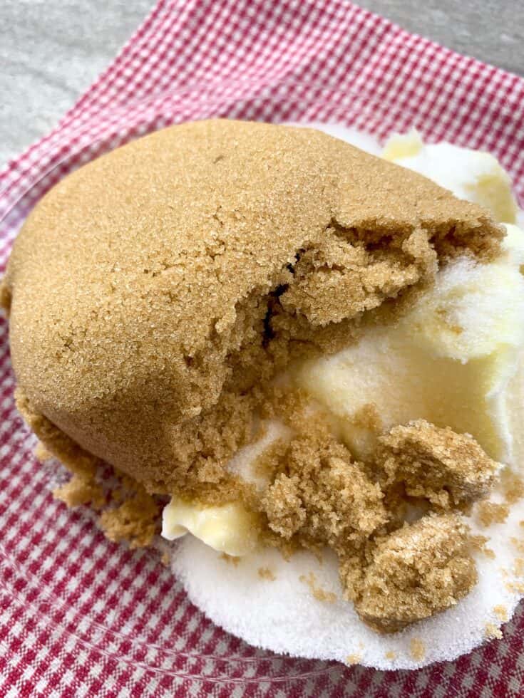 Brown sugar, sugar, and butter in a glass bowl