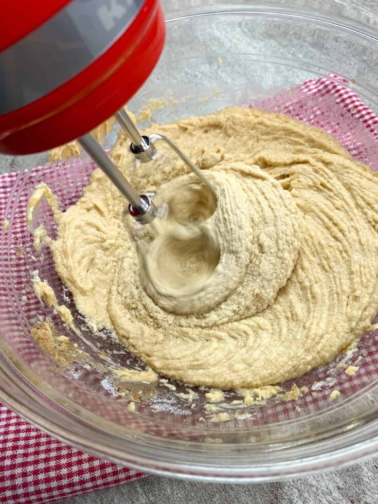 Hand mixer mixing cookie dough