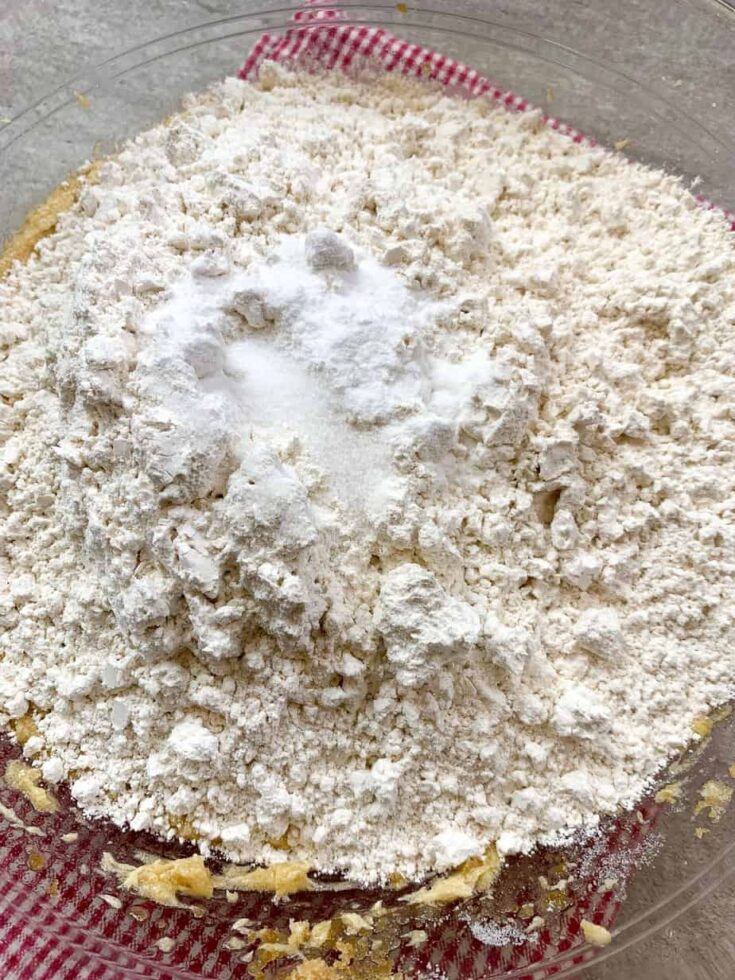 Flour, baking soda, and salt in a glass bowl