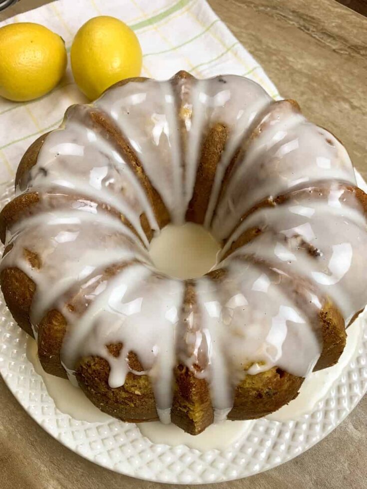 Lemon blueberry cake on a plate with glaze