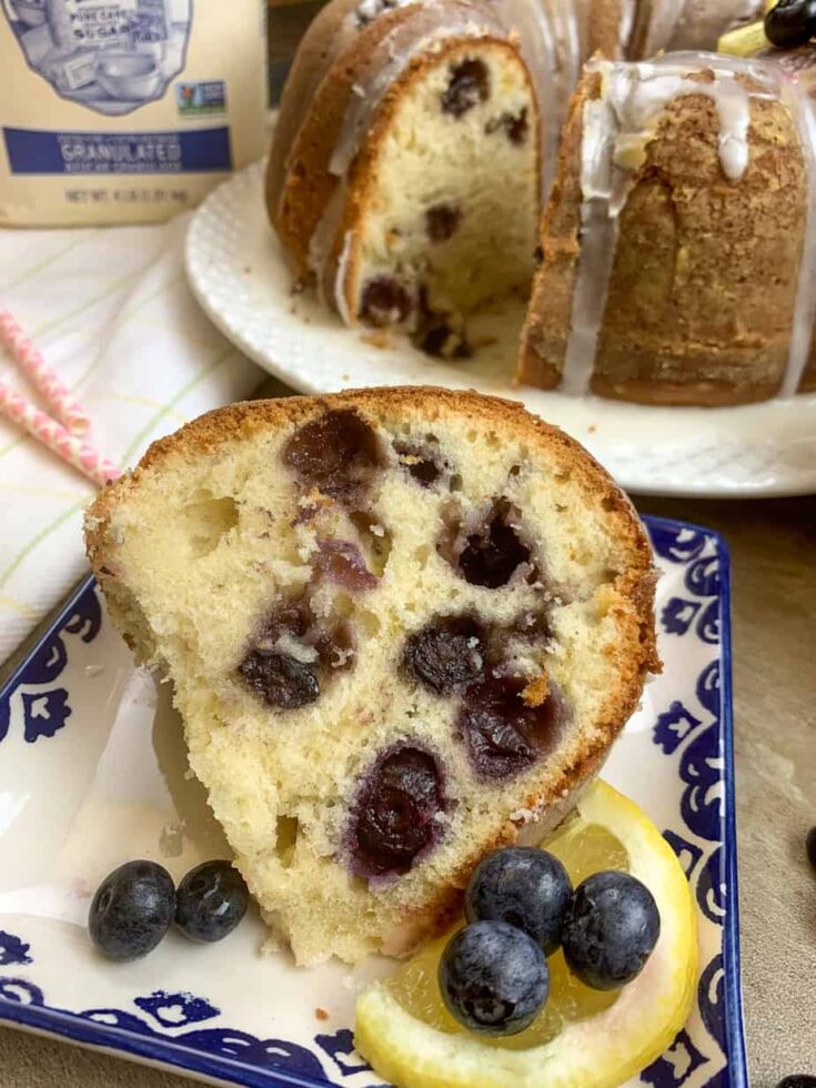 A slice of blueberry cake on a plate