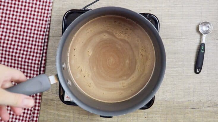 Chocolate cake ingredients in a saucepan