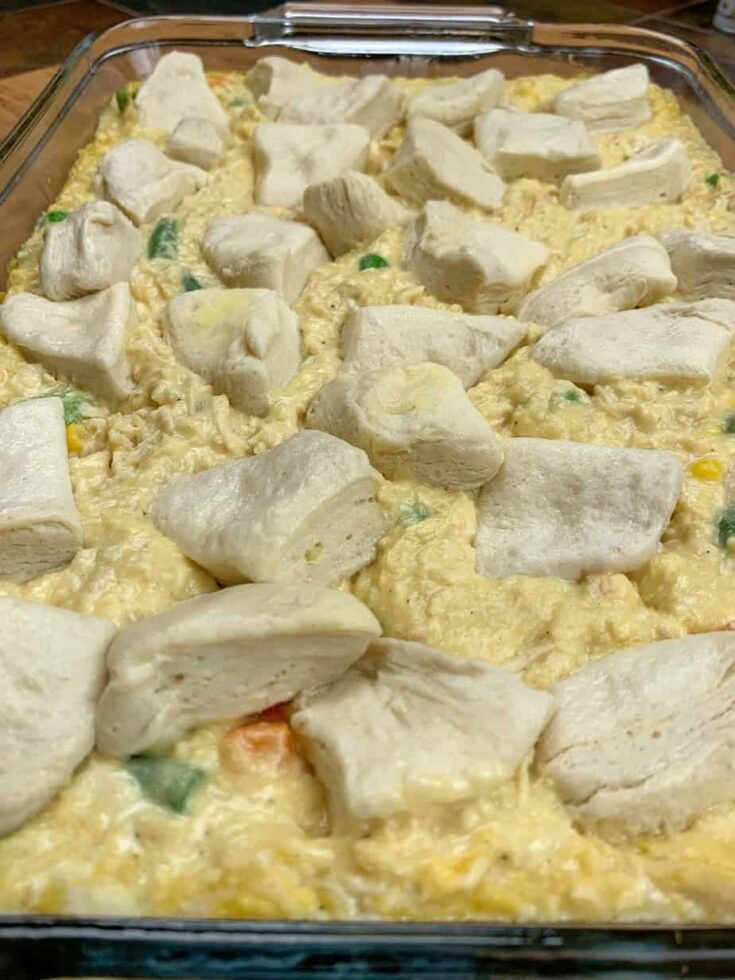 Chicken casserole with uncooked biscuits on top