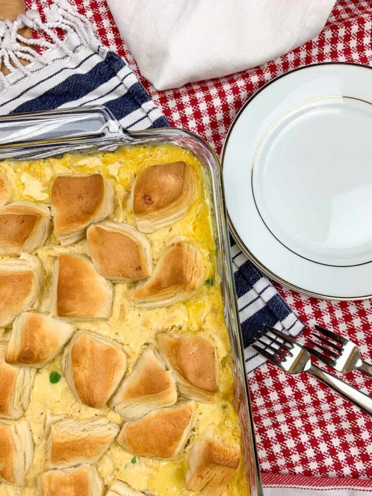 Baked chicken and biscuits recipe on a table with a plate