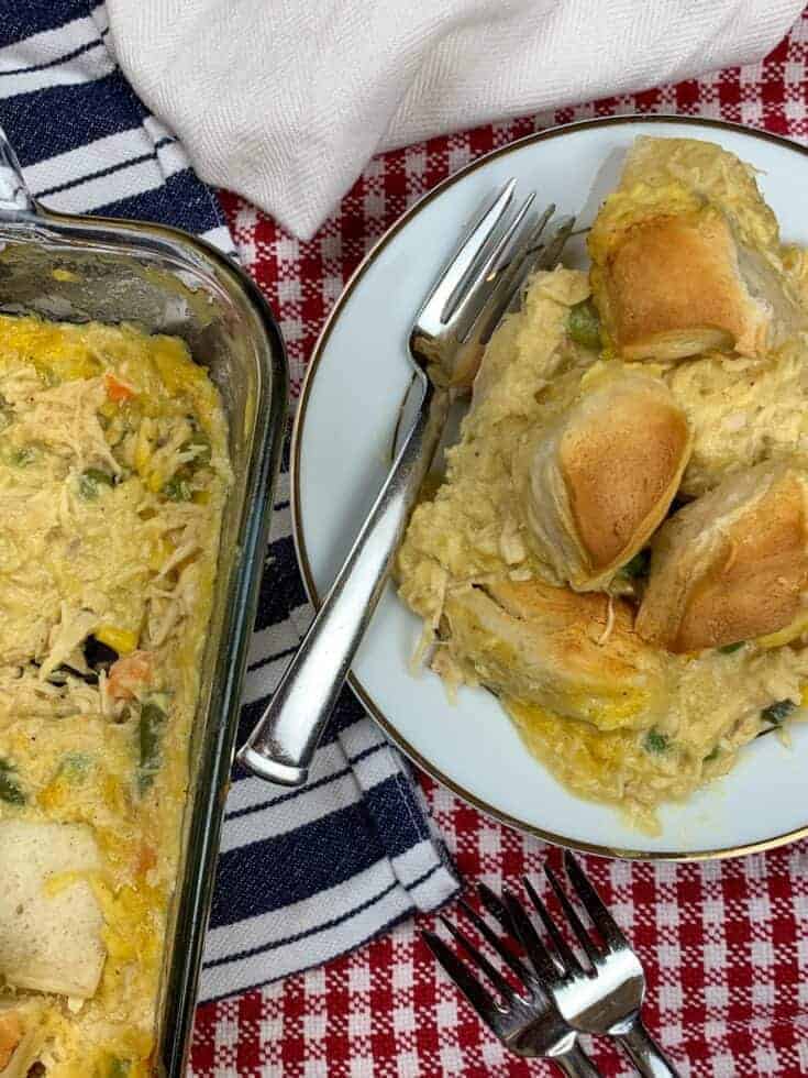 Chicken and biscuits in a casserole dish and on a plate.