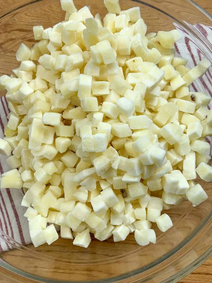 Cubed potatoes in a glass bowl