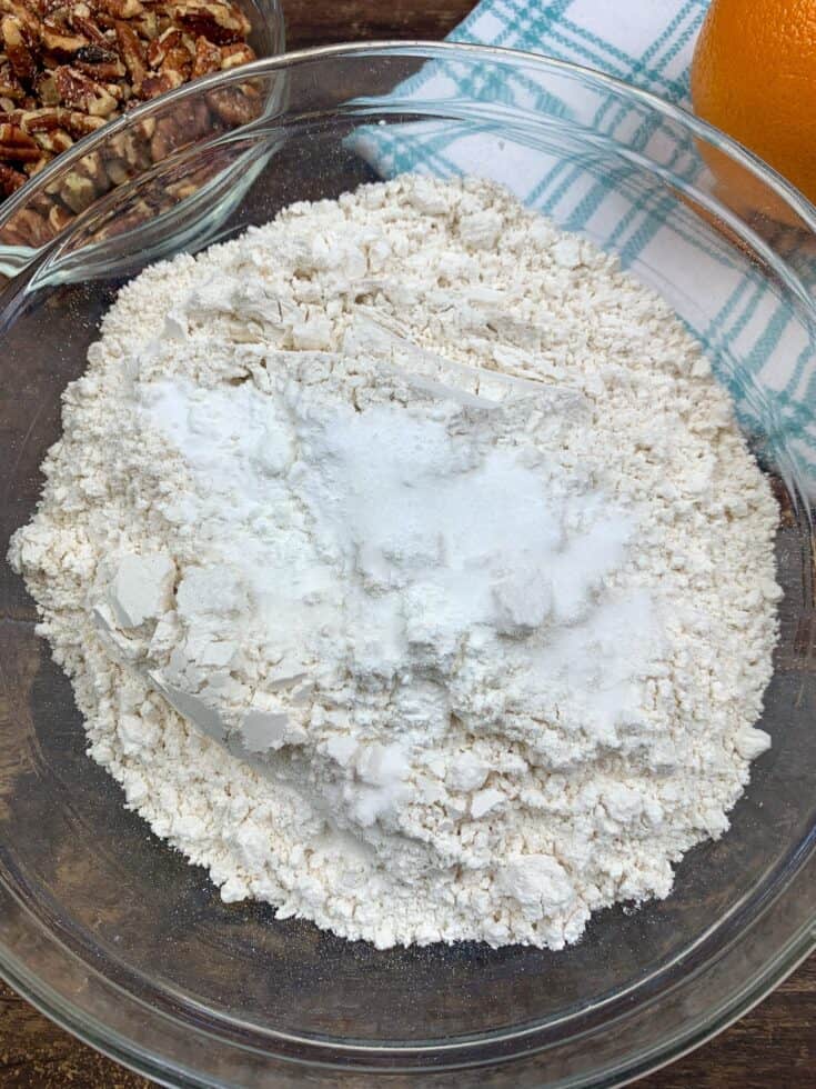 Flour, baking soda, baking powder, and salt in a bowl