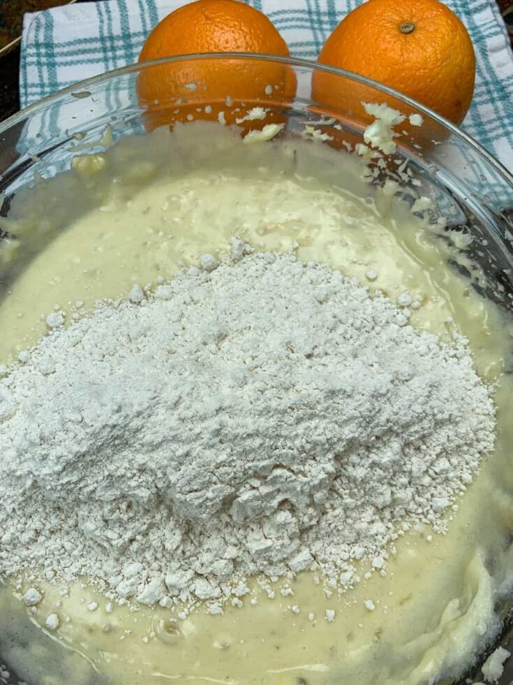 Flour in a bowl with banana bread mixture.