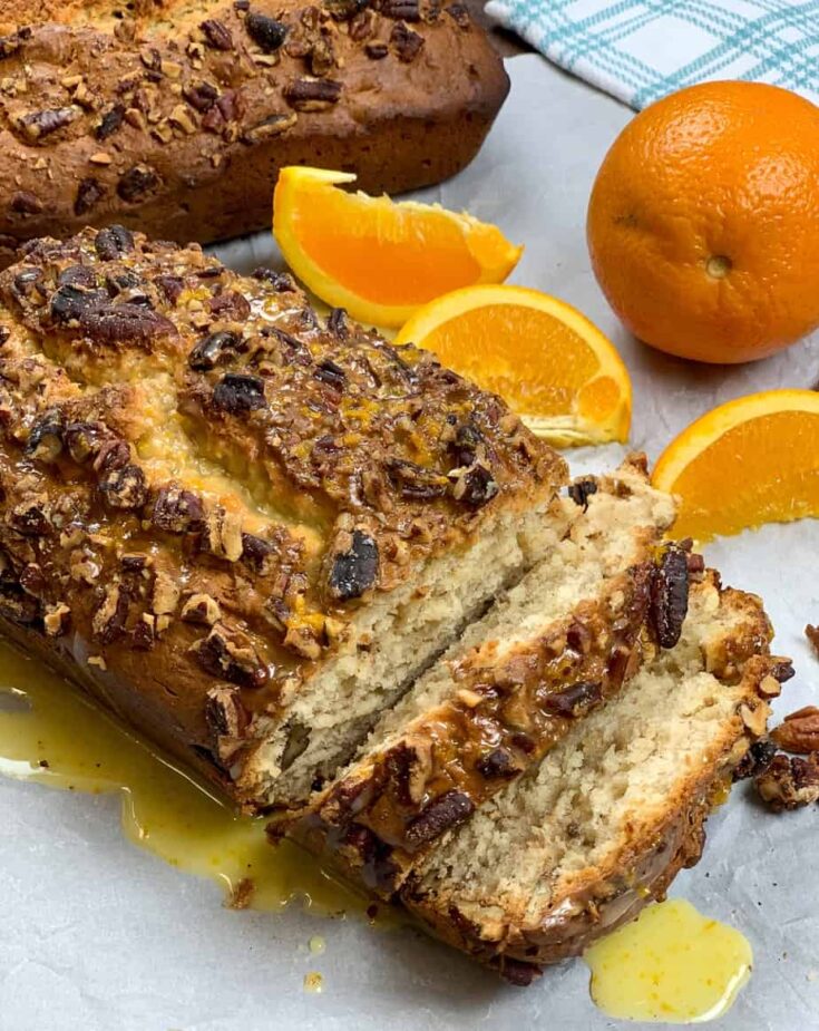 Banana bread sliced with oranges. 