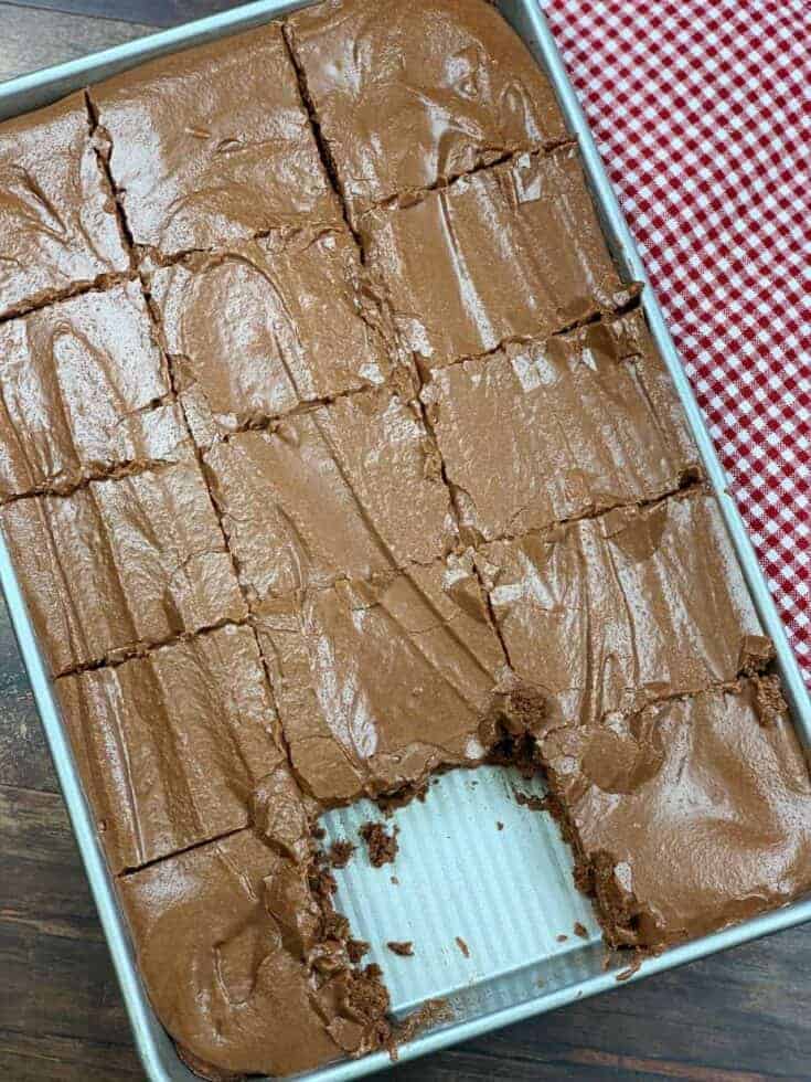 Lunch lady brownies in a pan with chocolate frosting