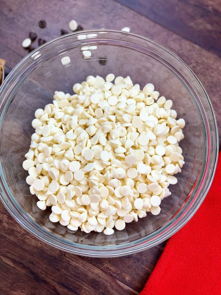 White chocolate chips in a glass bowl