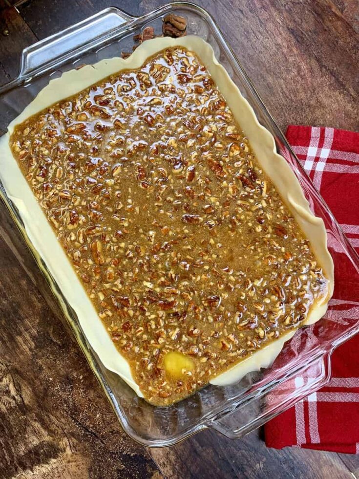 Pecan pie cobbler in a casserole dish