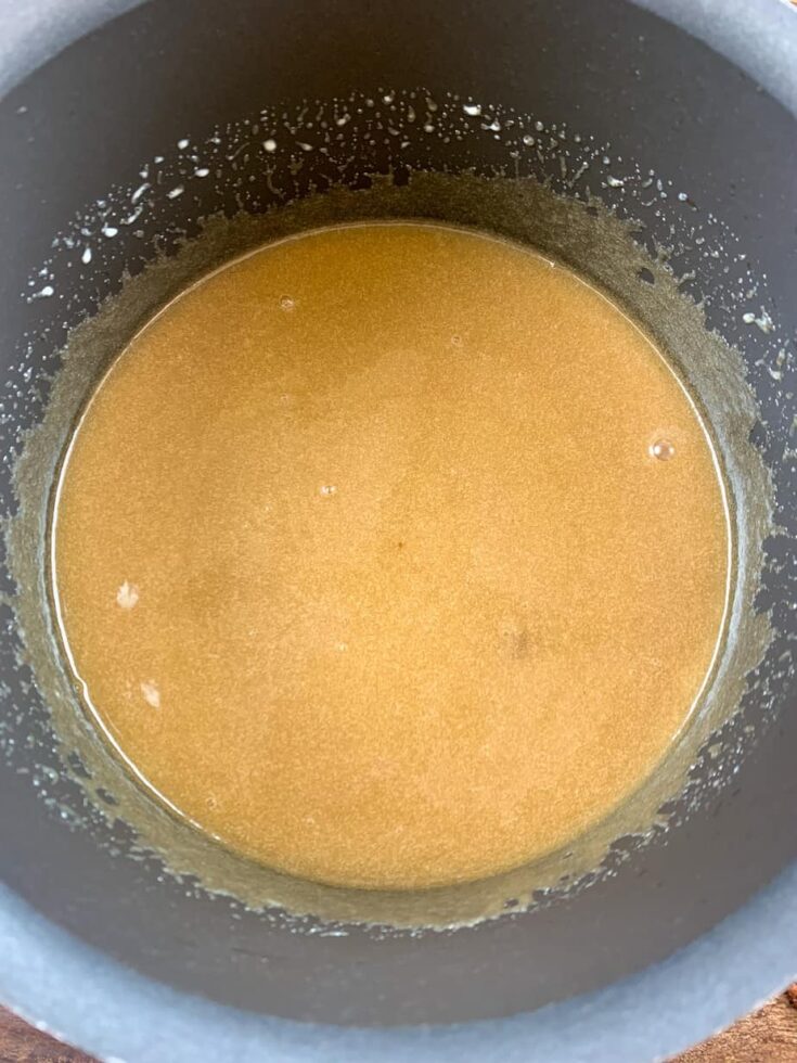 Praline pecan mixture in a saucepan, waiting to boil