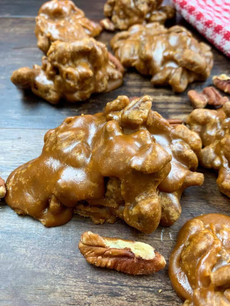 Praline pecans sitting on a counter