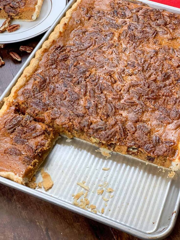 Baked pumpkin pecan bars in a jelly roll pan. 