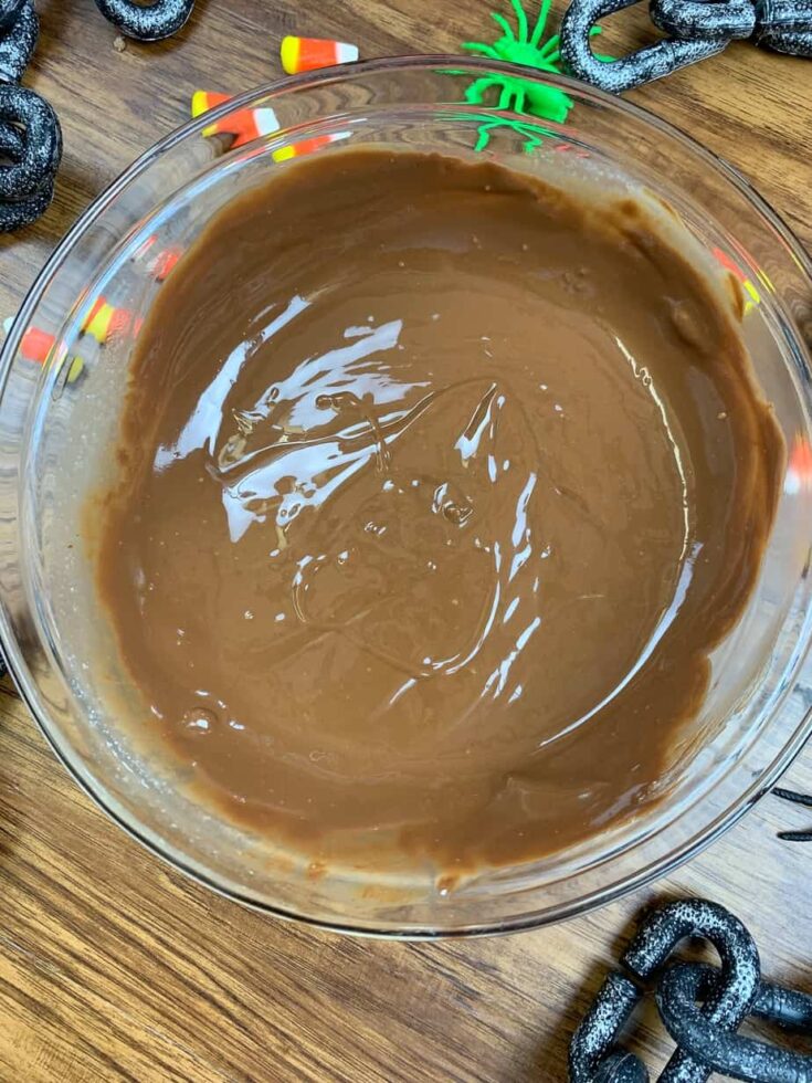 Melted chocolate and peanut butter in a glass bowl