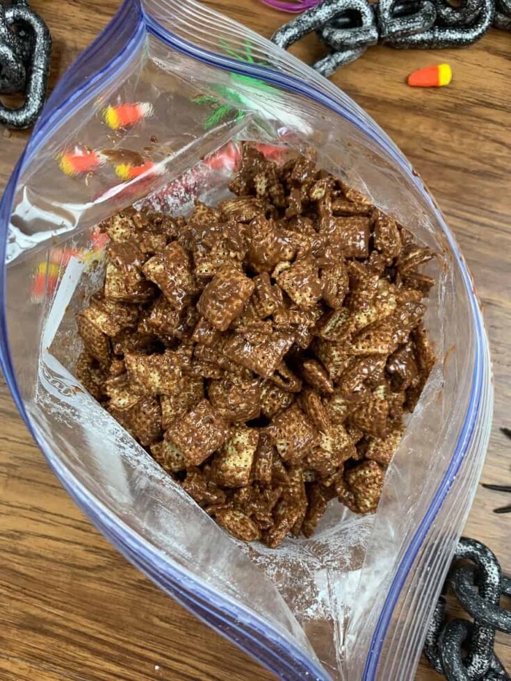 Chex Mix with melted chocolate in a large Ziplock bag