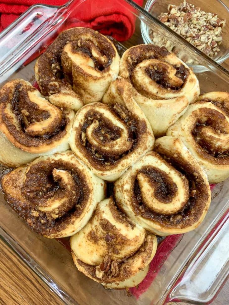 Baked cinnamon rolls in a pan.