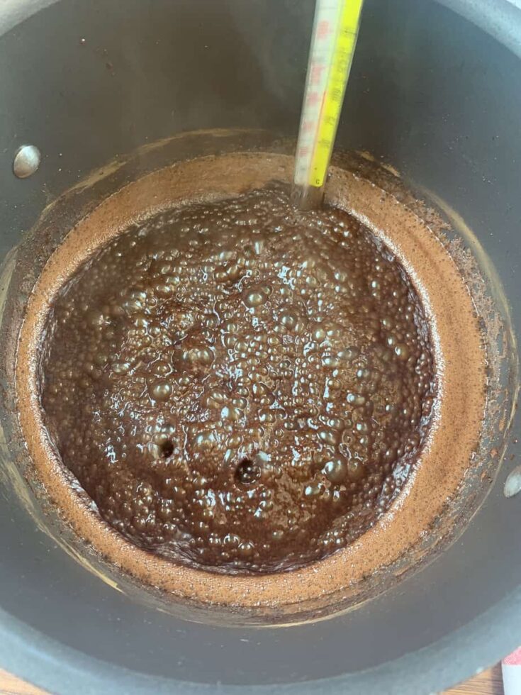 Boiling chocolate fudge in a saucepan