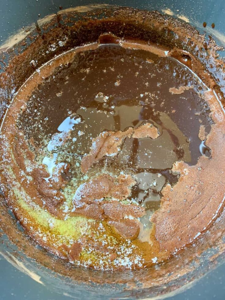 Butter melting in a pan of hot fudge.