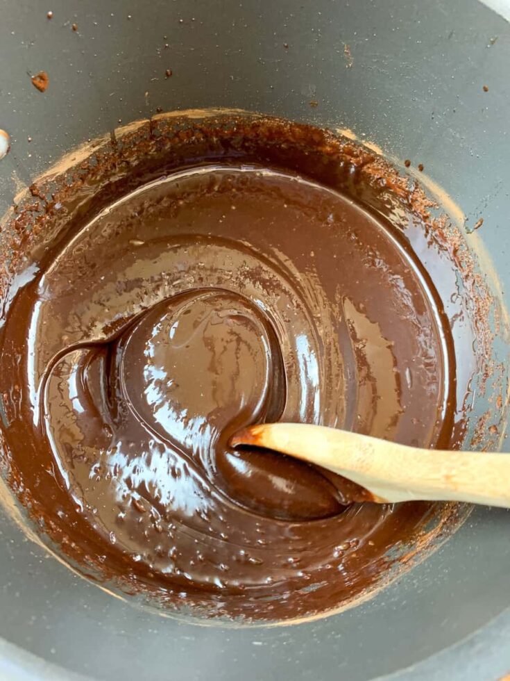 Stirring melted Hershey's chocolate fudge