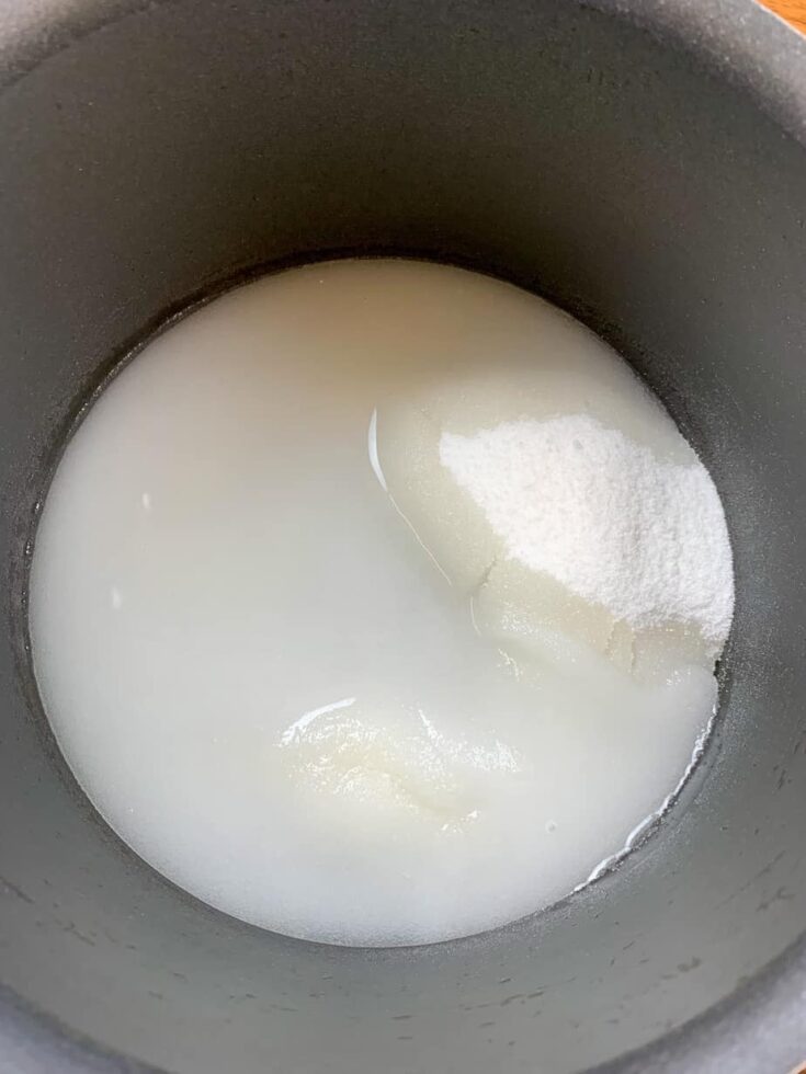 White sugar and water in a saucepan to make fudge