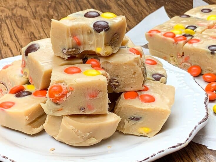 Peanut butter fudge stacked on a plate