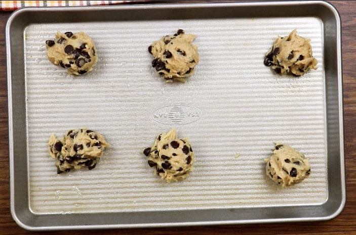 Chocolate chip banana cookies on a cookie sheet