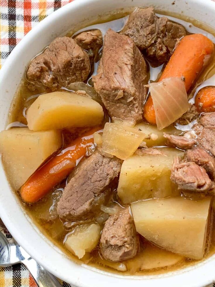 Beef stew in a white bowl