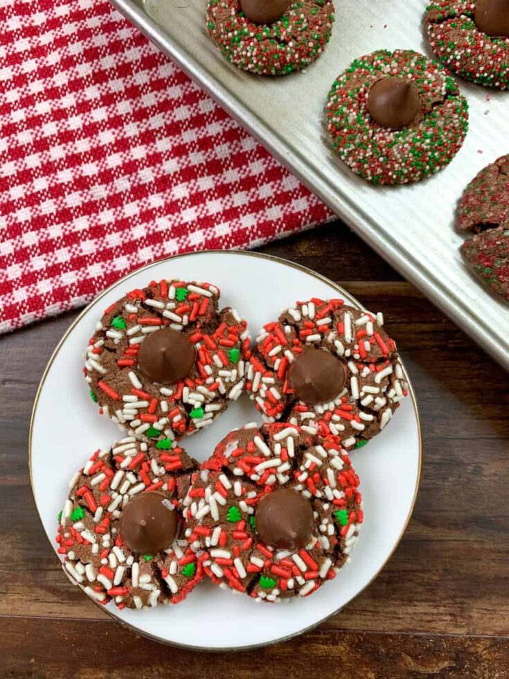 Decorated thumbprint cookies on a plate 