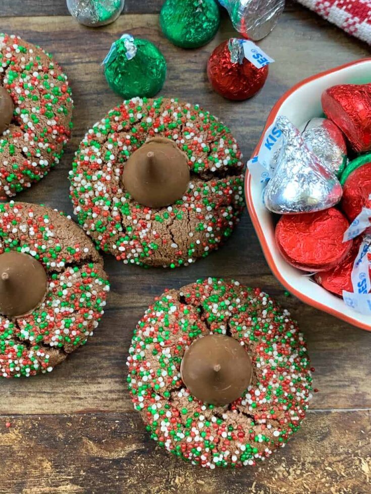 Sprinkle cookies with a Hershey Kiss on the counter