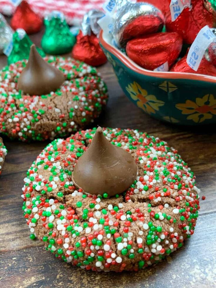 Thumbprint cookies on the counter with Hershey Kisses