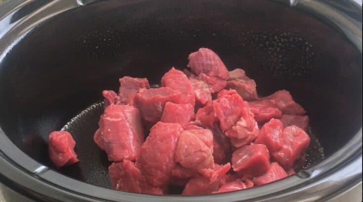 Cut up stew meat in a Crock Pot