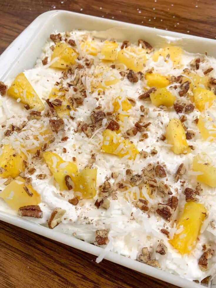 Pineapple lush dessert in a casserole dish 