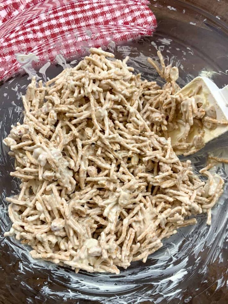 Mixing haystack cookies in a large bowl